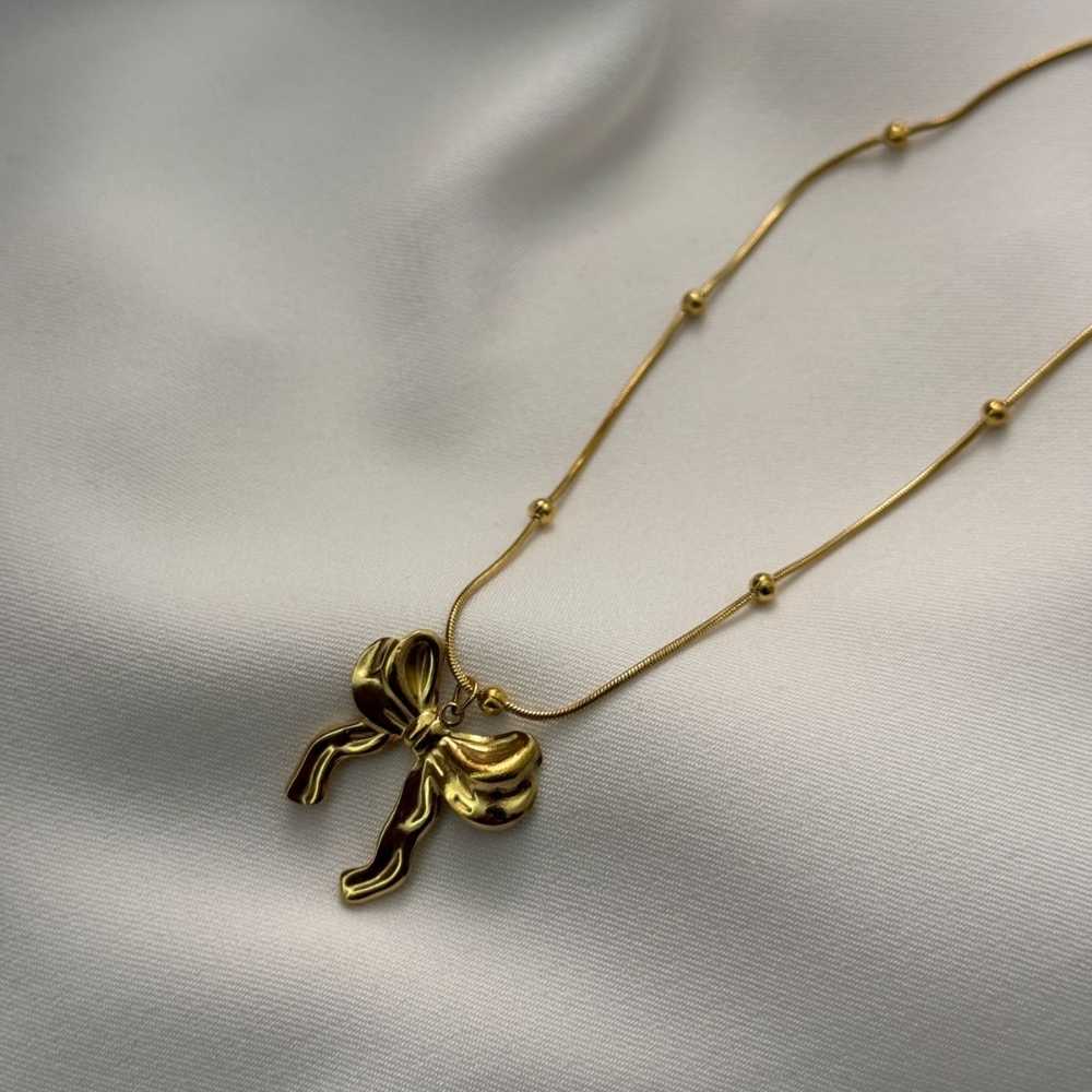 18K Titanium Bow Necklace